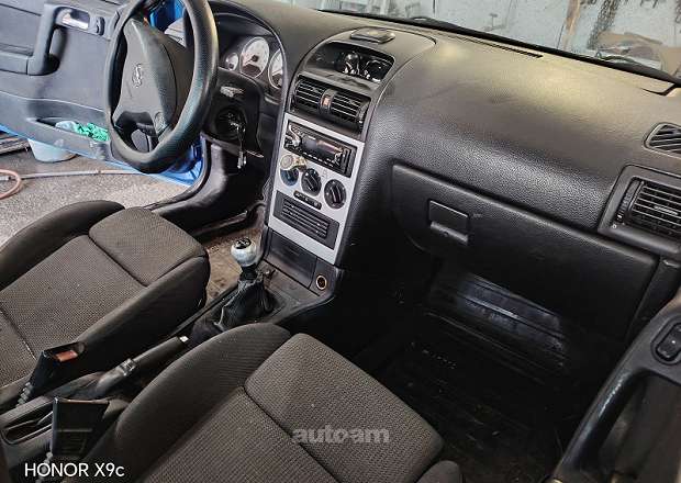Opel Astra 2002 — լուսանկար 7