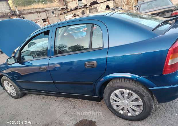 Opel Astra 2002 — լուսանկար 4