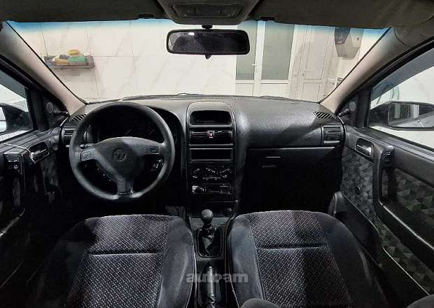 Opel Astra 1999 — լուսանկար 9