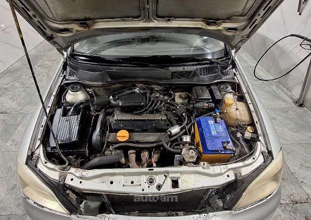 Opel Astra 1999 — լուսանկար 7