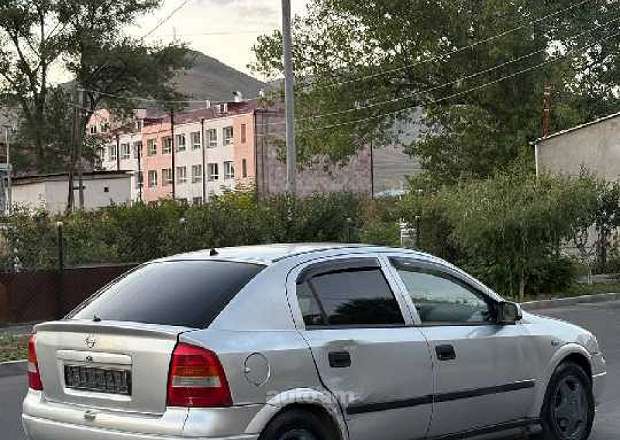 Opel Astra 1999 — լուսանկար 3