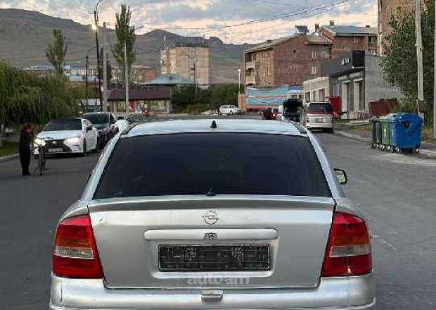 Opel Astra 1999 — լուսանկար 4