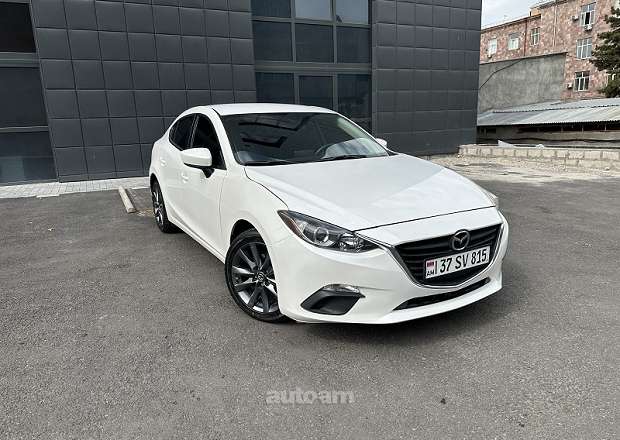 Mazda 3 2015 — photo 1
