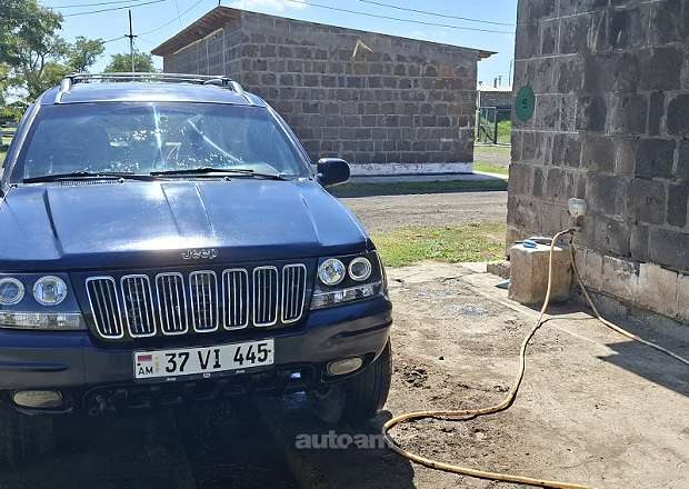 Jeep Grand Cherokee 2000 — լուսանկար 1