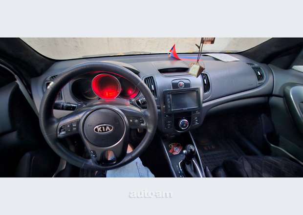 Kia Cerato 2012 — photo 1
