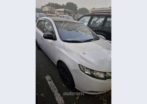 Kia Cerato 2012 — photo 3