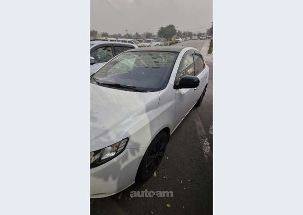 Kia Cerato 2012 — photo 2
