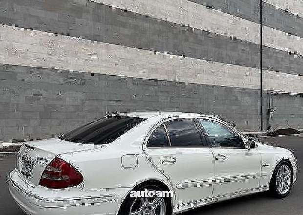 Mercedes-Benz E 55 AMG 2002 — photo 7