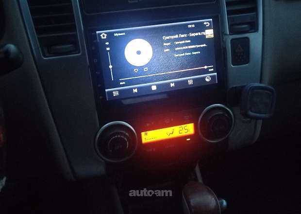 Nissan Tiida 2010 — լուսանկար 11