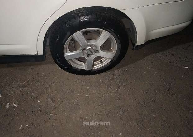 Nissan Tiida 2010 — լուսանկար 14