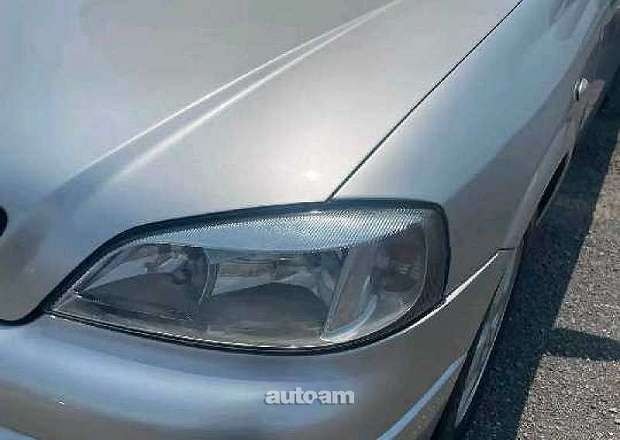 Opel Astra 1999 — լուսանկար 7