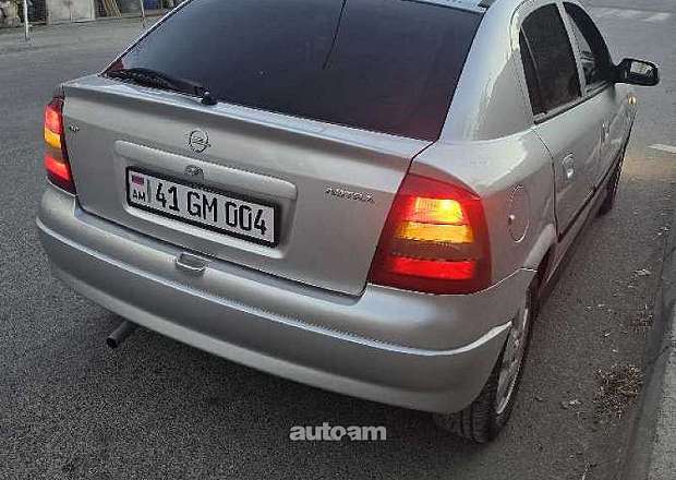 Opel Astra 1999 — լուսանկար 6