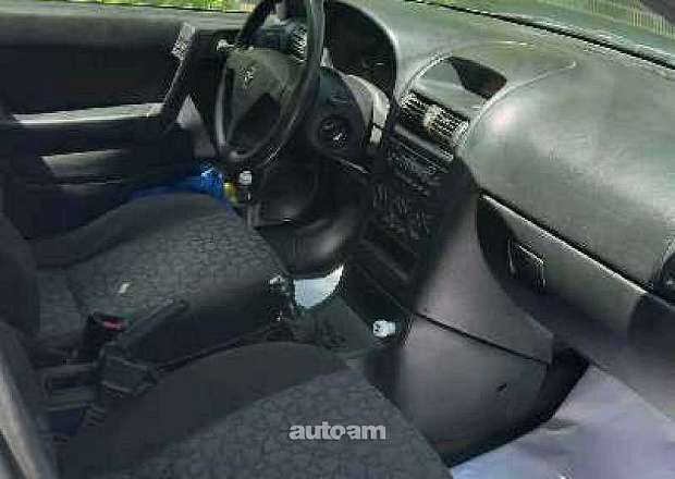 Opel Astra 1999 — լուսանկար 10