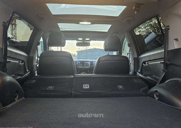 Kia Sportage 2012 — լուսանկար 2