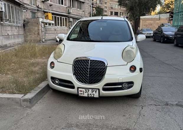 Nissan March 2005 — լուսանկար 2