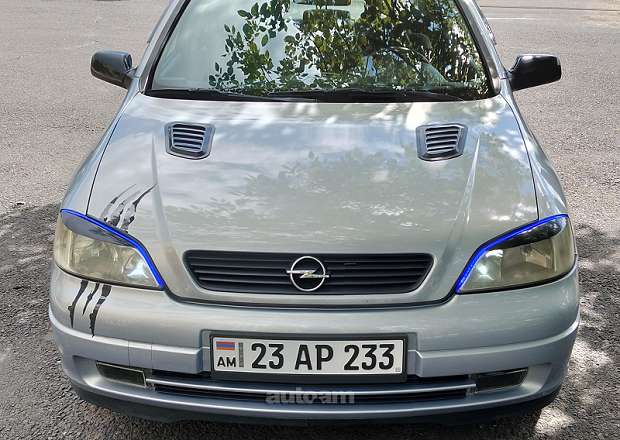 Opel Astra 1999 — լուսանկար 7