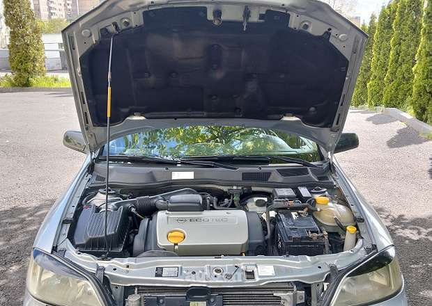 Opel Astra 1999 — լուսանկար 11
