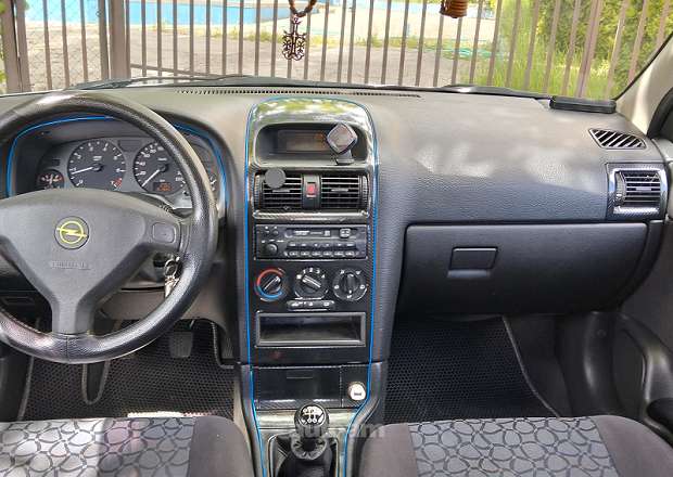 Opel Astra 1999 — լուսանկար 12