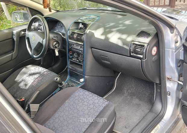 Opel Astra 1999 — լուսանկար 8