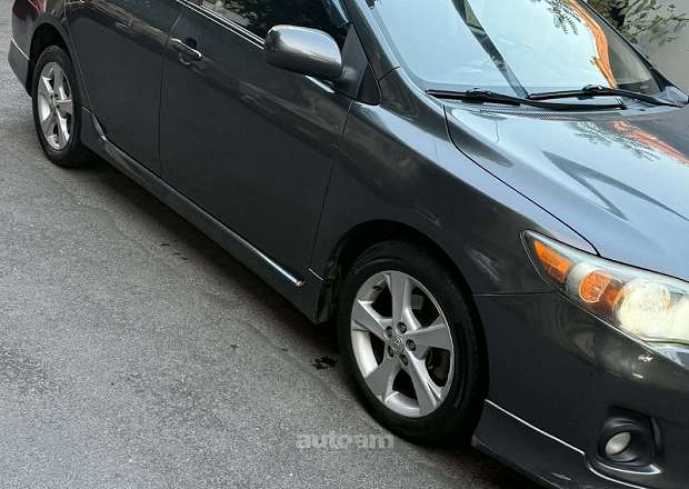 Toyota Corolla 2011 — լուսանկար 14