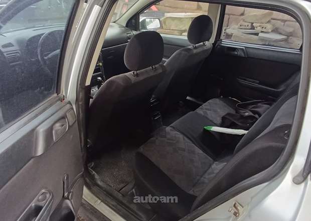 Opel Astra 1999 — լուսանկար 5