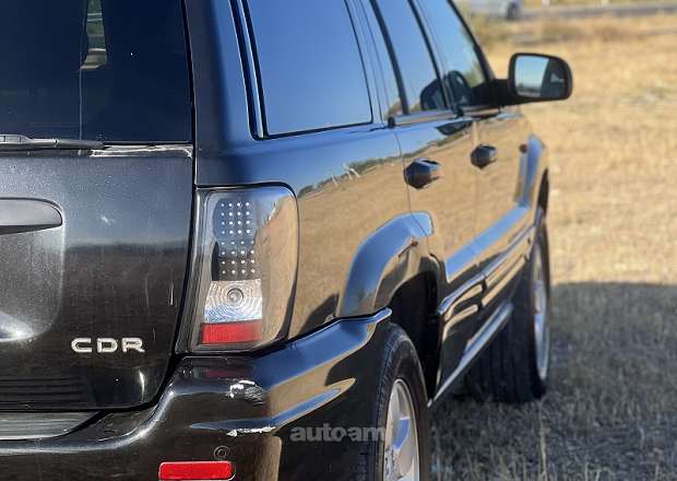 Jeep Grand Cherokee 2003 — լուսանկար 12