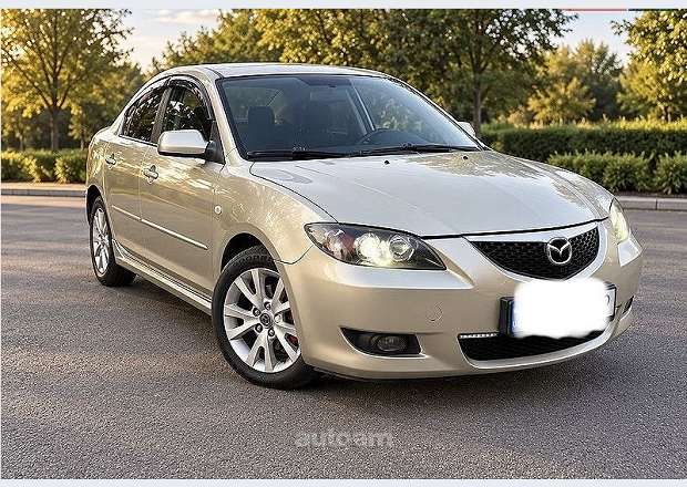 Mazda 3 2006 — photo 1