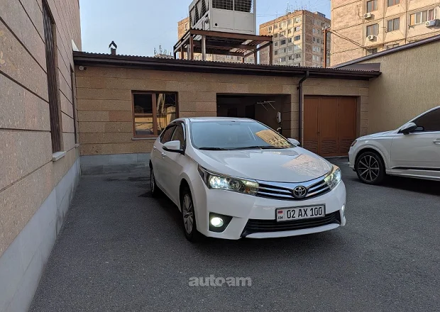 Toyota Corolla 2014 — լուսանկար 10