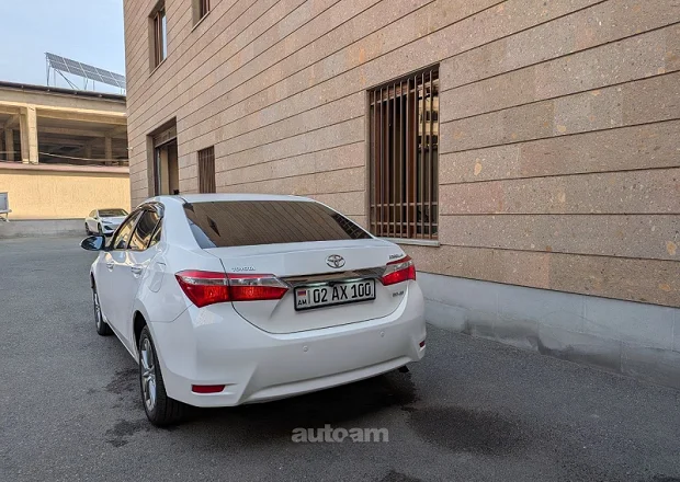 Toyota Corolla 2014 — լուսանկար 12